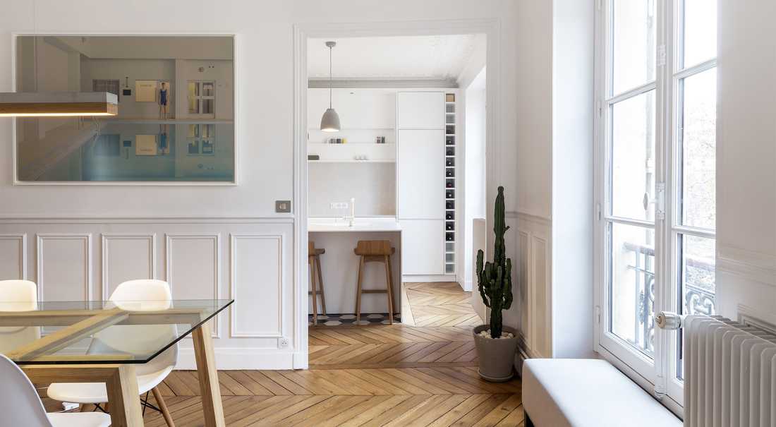 Aménagement d'un cuisine ouverte dans un salon par un architecte à Lyon