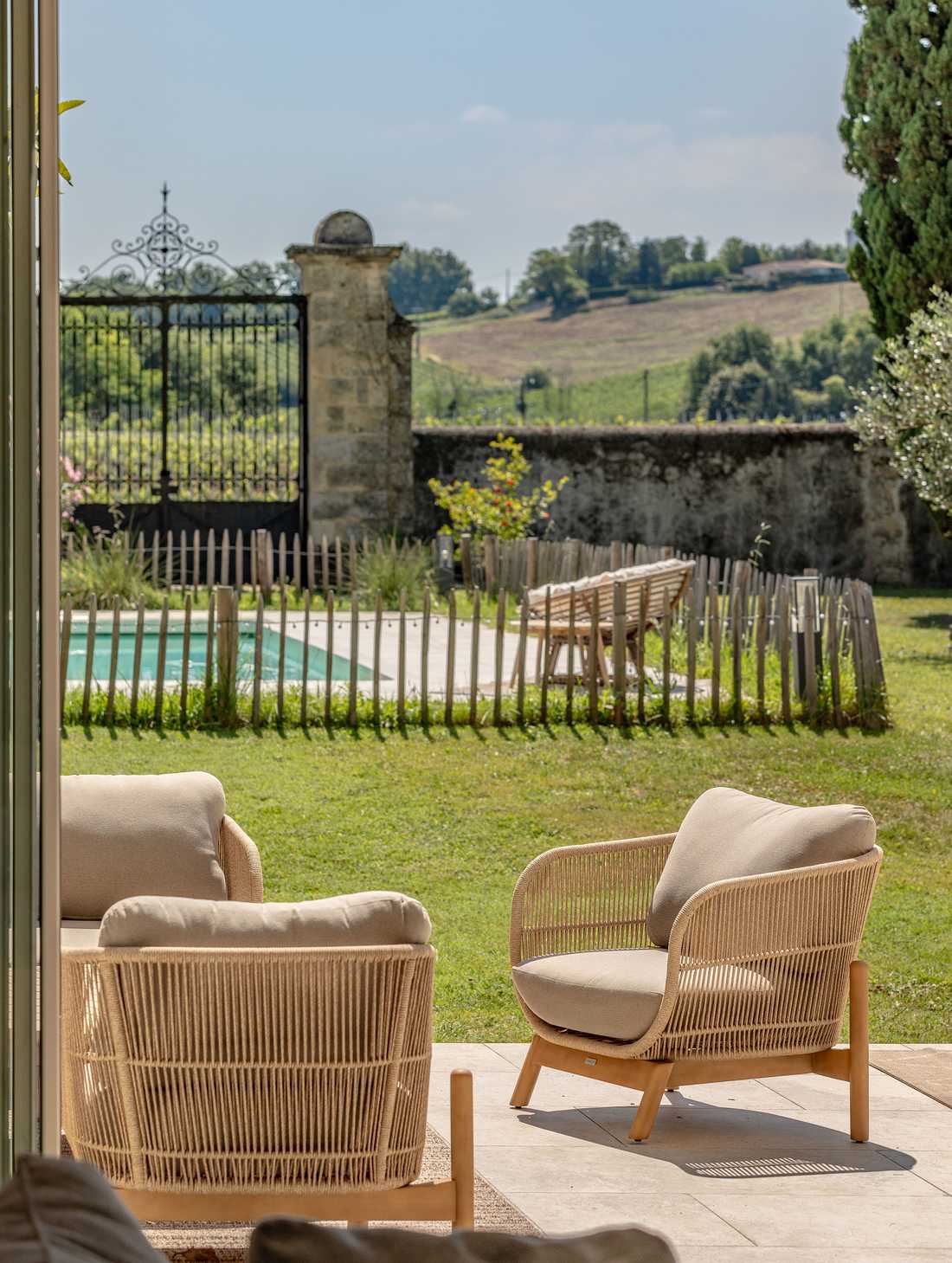 Landscaping of a castle garden with swimming pool in the Rhône area